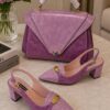 Purple suede handbag with purple suede slingback heels.