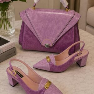 Purple suede handbag with purple suede slingback heels.